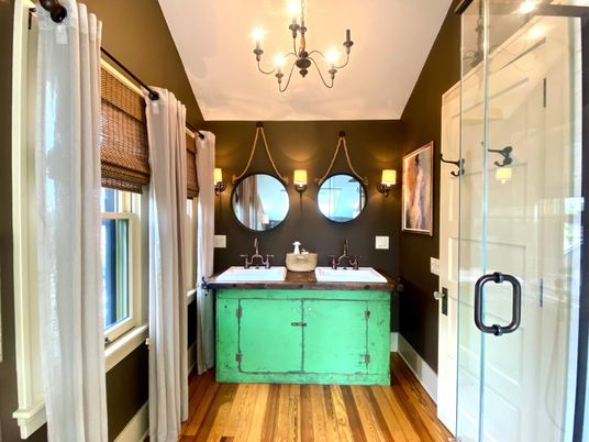 Bathroom, Chandelier, Dual Sink Vanities, Glass Shower, Interior, Wood Texture Flooring