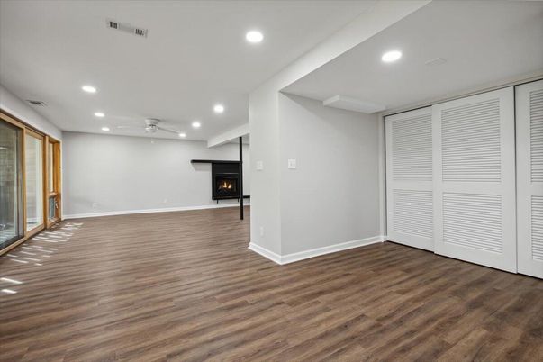Empty room, Fireplace, Interior, Recessed Lighting, Wood Texture Flooring