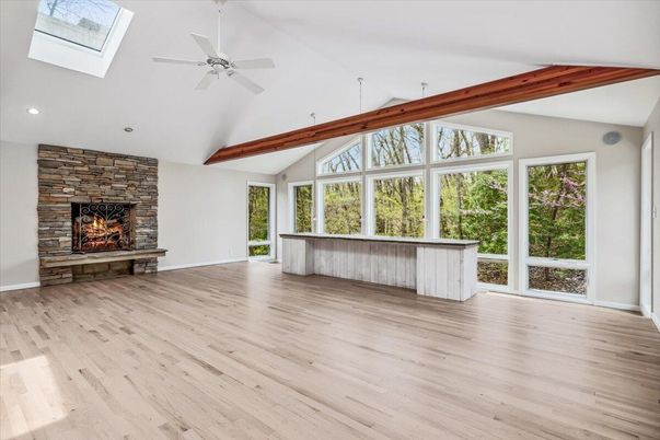 Empty room, Fireplace, Interior, Recessed Lighting, Wooden Beams, Wood Texture Flooring
