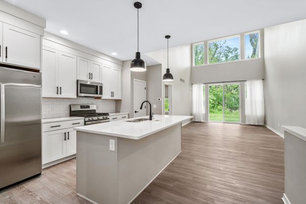 Interior, Kitchen, Pendant Lights, Recessed Lighting, Stainless Steel Appliances, Wood Texture Flooring