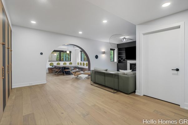 Dining room, Fireplace, Interior, Living room, Recessed Lighting, Wood Texture Flooring