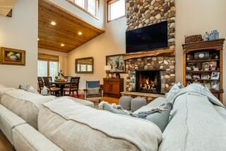 Bedroom, Dining room, Fireplace, Interior, Living room, Recessed Lighting, Stone Walls, Wooden Ceilings, Wood Texture Flooring