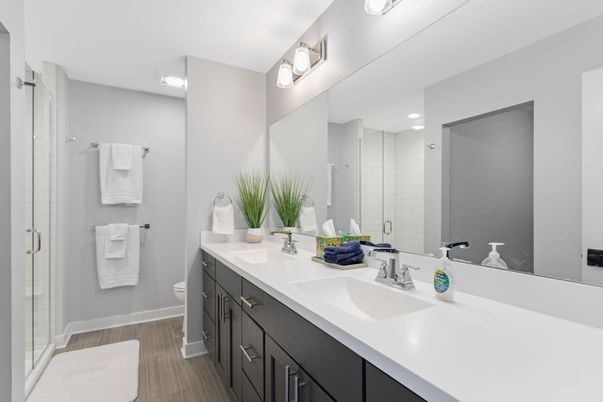 Bathroom, Dual Sink Vanities, Glass Shower, Interior, Recessed Lighting, Wood Texture Flooring