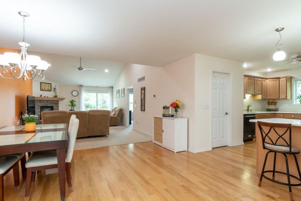 Chandelier, Dining room, Fireplace, Interior, Kitchen, Living room, Pendant Lights, Recessed Lighting, Wood Texture Flooring
