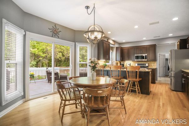 Chandelier, Dining room, Interior, Kitchen, Pendant Lights, Recessed Lighting, Stainless Steel Appliances, Wood Texture Flooring