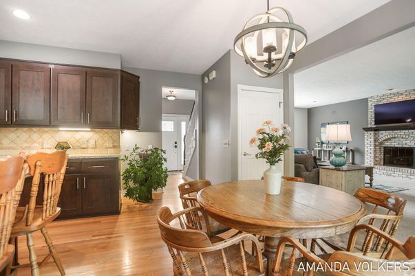 Dining room, Fireplace, Interior, Pendant Lights, Recessed Lighting, Wood Texture Flooring