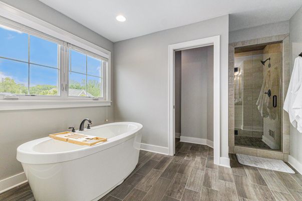 Bathroom, Free Standing Baths, Glass Shower, Interior, Recessed Lighting, Wood Texture Flooring