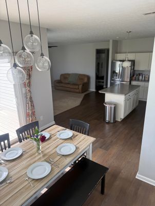 Dining room, Interior, Kitchen, Pendant Lights, Stainless Steel Appliances, Wood Texture Flooring