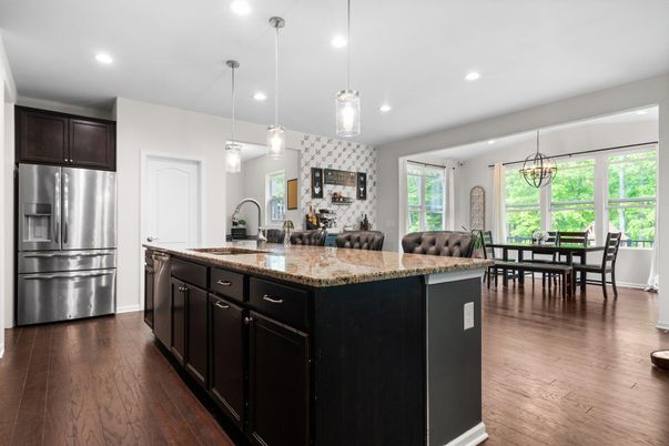 Chandelier, Dining room, Interior, Kitchen, Pendant Lights, Recessed Lighting, Stainless Steel Appliances, Wood Texture Flooring