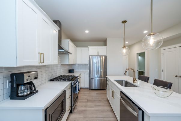 Interior, Kitchen, Pendant Lights, Recessed Lighting, Stainless Steel Appliances, Wood Texture Flooring