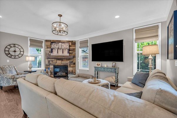 Fireplace, Interior, Living room, Recessed Lighting, Stone Walls, Wood Texture Flooring