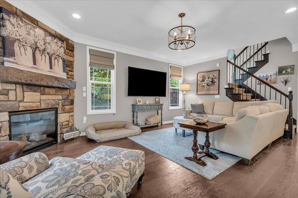 Chandelier, Fireplace, Interior, Living room, Recessed Lighting, Wood Texture Flooring