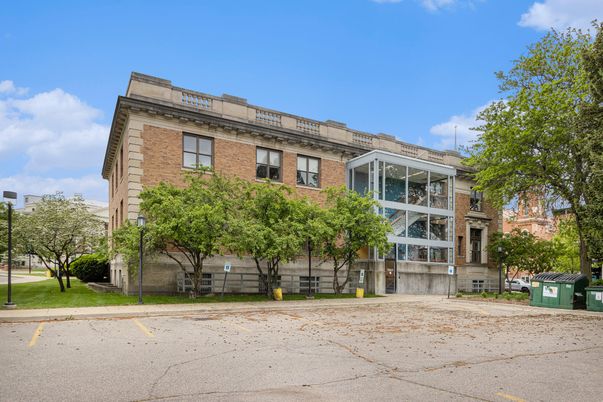 Exterior, Facade, Brick Facade, Condo Building