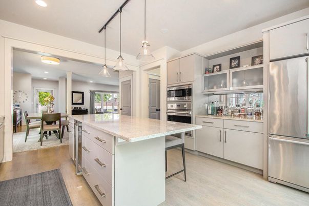 Dining room, Interior, Kitchen, Pendant Lights, Recessed Lighting, Stainless Steel Appliances, Wood Texture Flooring