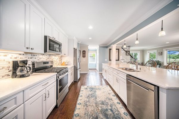 Dining room, Interior, Kitchen, Pendant Lights, Recessed Lighting, Stainless Steel Appliances, Wood Texture Flooring
