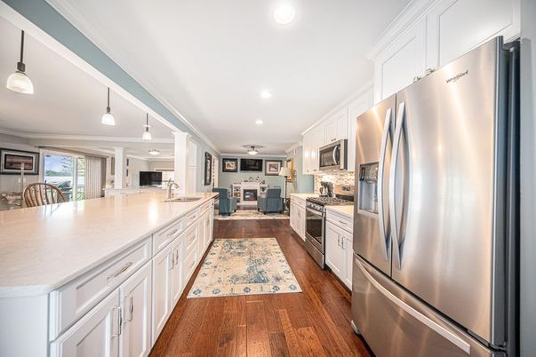 Interior, Kitchen, Pendant Lights, Recessed Lighting, Stainless Steel Appliances, Wood Texture Flooring