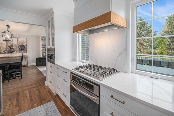 Dining room, Interior, Kitchen, Marble Walls, Pendant Lights, Stainless Steel Appliances, Wood Texture Flooring