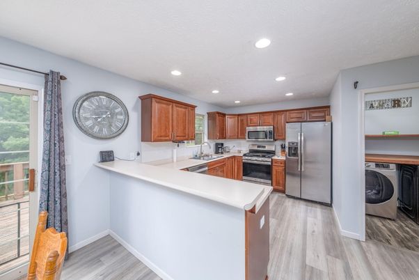 Interior, Kitchen, Recessed Lighting, Stainless Steel Appliances, Washer, Wood Texture Flooring