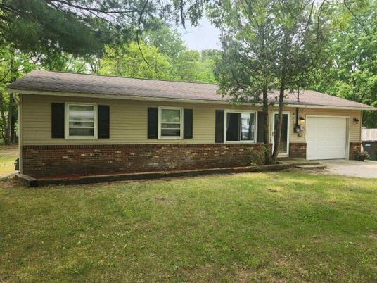 Attached, Backyard, Exterior, Facade, Brick Facade, Ranch