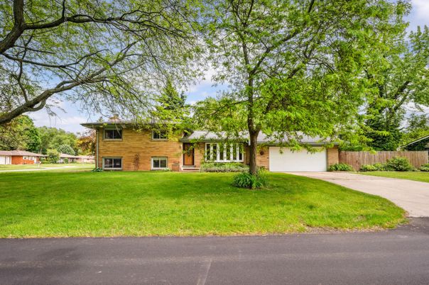 Attached, Backyard, Exterior, Facade, Brick Facade, Split Level