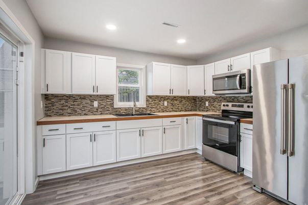 Interior, Kitchen, Recessed Lighting, Stainless Steel Appliances, Wood Texture Flooring