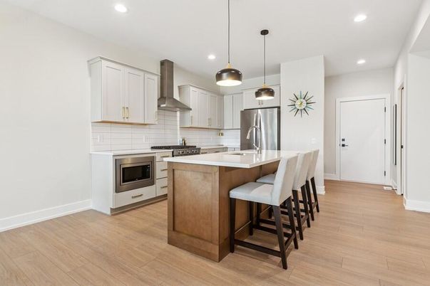 Interior, Kitchen, Pendant Lights, Recessed Lighting, Stainless Steel Appliances, Wood Texture Flooring
