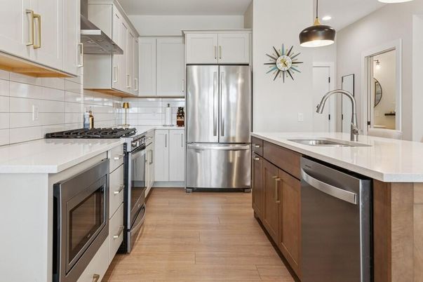 Interior, Kitchen, Pendant Lights, Recessed Lighting, Stainless Steel Appliances, Wood Texture Flooring