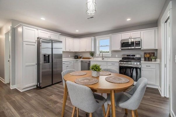 Dining room, Interior, Kitchen, Recessed Lighting, Stainless Steel Appliances, Wood Texture Flooring