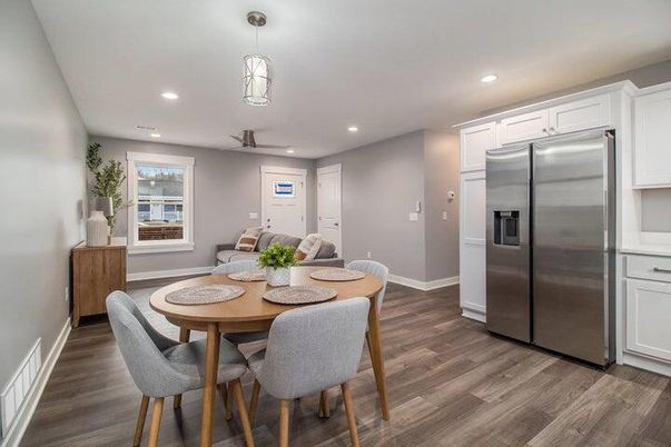 Dining room, Interior, Kitchen, Pendant Lights, Recessed Lighting, Stainless Steel Appliances, Wood Texture Flooring