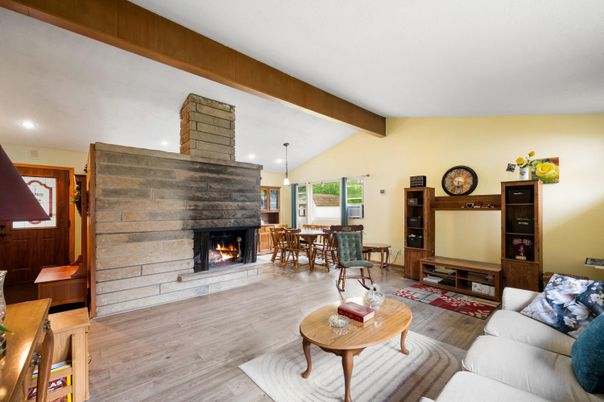 Dining room, Fireplace, Interior, Living room, Pendant Lights, Recessed Lighting, Wooden Beams, Wood Texture Flooring