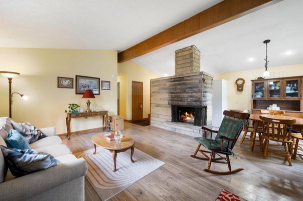 Dining room, Fireplace, Interior, Living room, Pendant Lights, Recessed Lighting, Wooden Beams, Wood Texture Flooring