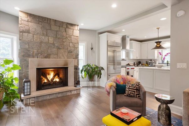 Fireplace, Interior, Kitchen, Living room, Pendant Lights, Recessed Lighting, Stainless Steel Appliances, Stone Walls, Wood Texture Flooring