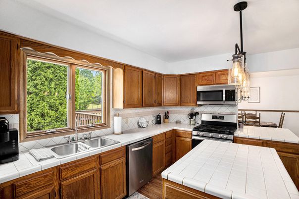 Interior, Kitchen, Pendant Lights, Stainless Steel Appliances, Tile Countertops
