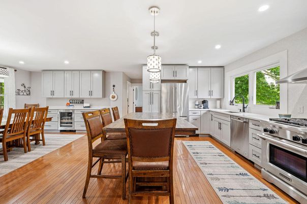 Dining room, Interior, Kitchen, Pendant Lights, Recessed Lighting, Stainless Steel Appliances, Wood Texture Flooring