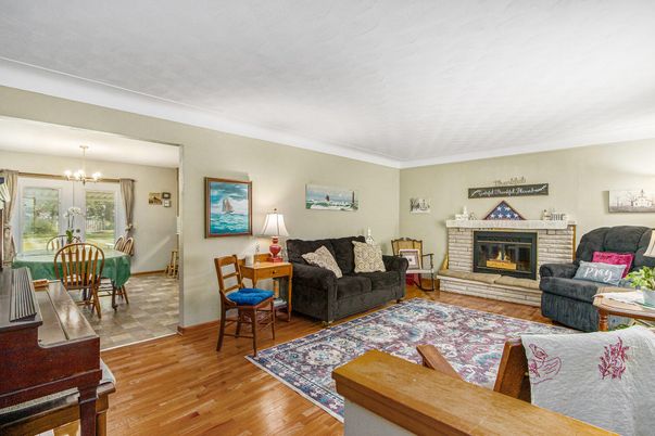 Dining room, Fireplace, Interior, Living room, Pendant Lights, Wood Texture Flooring
