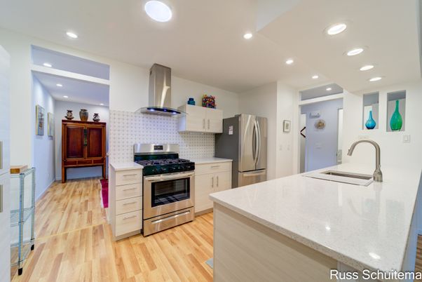 Interior, Kitchen, Recessed Lighting, Stainless Steel Appliances, Wood Texture Flooring