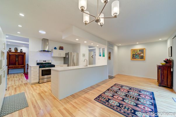 Interior, Kitchen, Pendant Lights, Recessed Lighting, Stainless Steel Appliances, Wood Texture Flooring