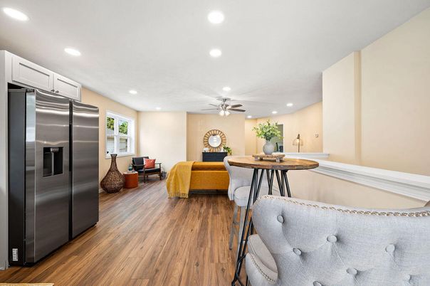 Dining room, Interior, Kitchen, Living room, Recessed Lighting, Stainless Steel Appliances, Wood Texture Flooring