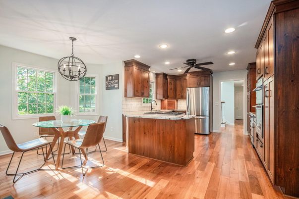 Chandelier, Dining room, Interior, Kitchen, Recessed Lighting, Stainless Steel Appliances, Wood Texture Flooring