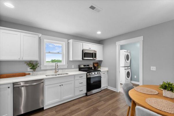 Interior, Kitchen, Recessed Lighting, Stainless Steel Appliances, Washer, Wood Texture Flooring