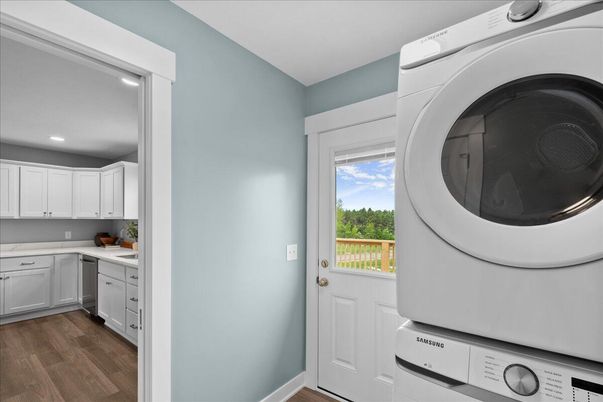 Interior, Kitchen, Recessed Lighting, Washer, Wood Texture Flooring