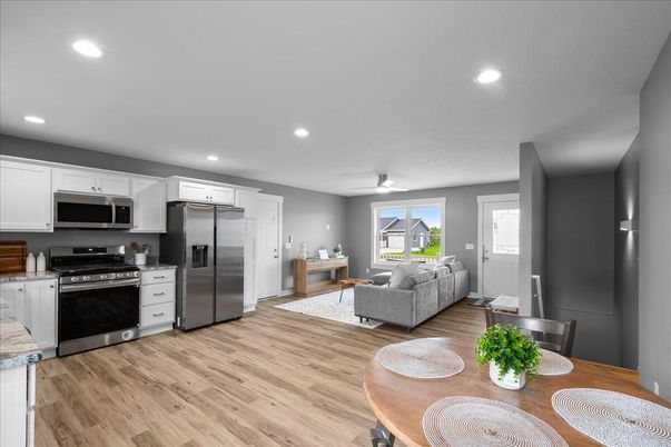 Dining room, Interior, Kitchen, Living room, Recessed Lighting, Stainless Steel Appliances, Wood Texture Flooring