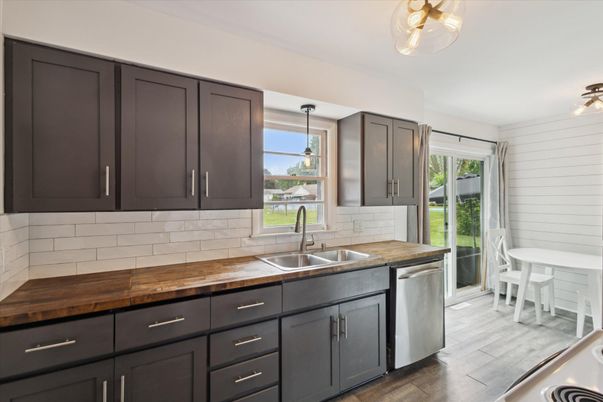 Dining room, Interior, Kitchen, Pendant Lights, Stainless Steel Appliances, Wood Texture Flooring