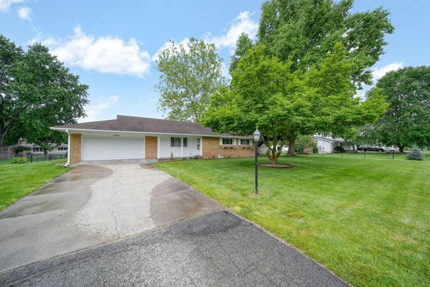 Attached, Backyard, Exterior, Facade, Brick Facade, Ranch