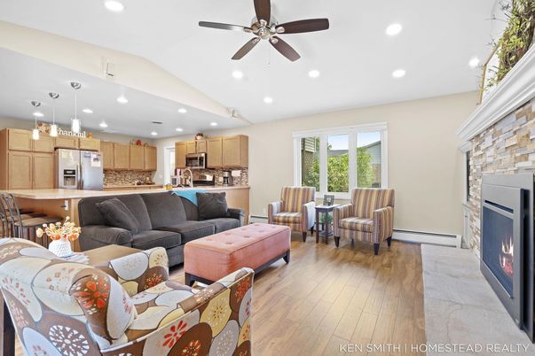 Fireplace, Interior, Kitchen, Living room, Pendant Lights, Recessed Lighting, Stainless Steel Appliances, Wood Texture Flooring