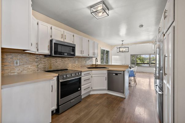Interior, Kitchen, Pendant Lights, Stainless Steel Appliances, Wood Texture Flooring