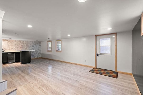 Empty room, Interior, Recessed Lighting, Stone Walls, Wood Texture Flooring