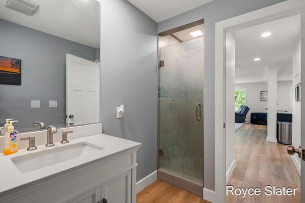 Bathroom, Glass Shower, Interior, Recessed Lighting, Wood Texture Flooring