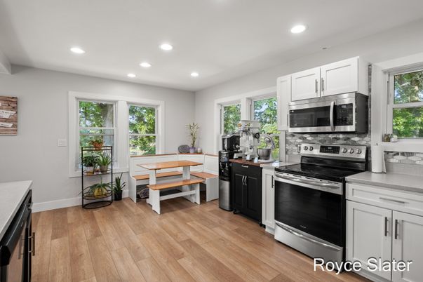 Dining room, Interior, Kitchen, Recessed Lighting, Stainless Steel Appliances, Wood Texture Flooring