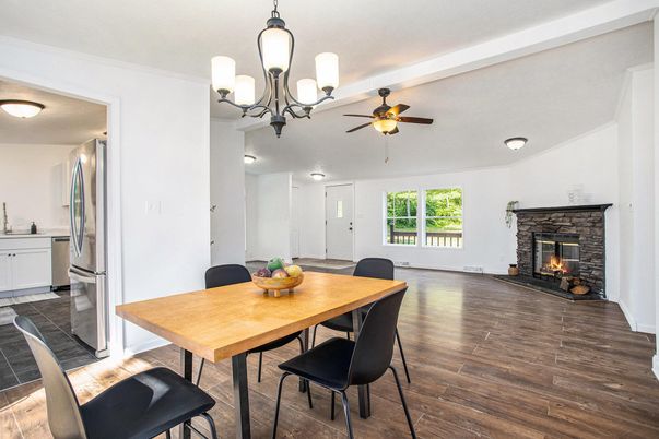 Chandelier, Dining room, Fireplace, Interior, Kitchen, Wood Texture Flooring